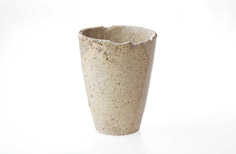 Aged ceramic cup.