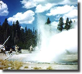 A photo shows how early visitors watched Minute Geyser erupt.