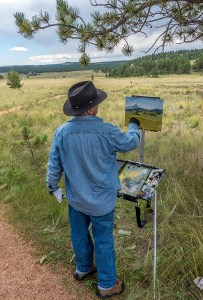 Artist painting in the park