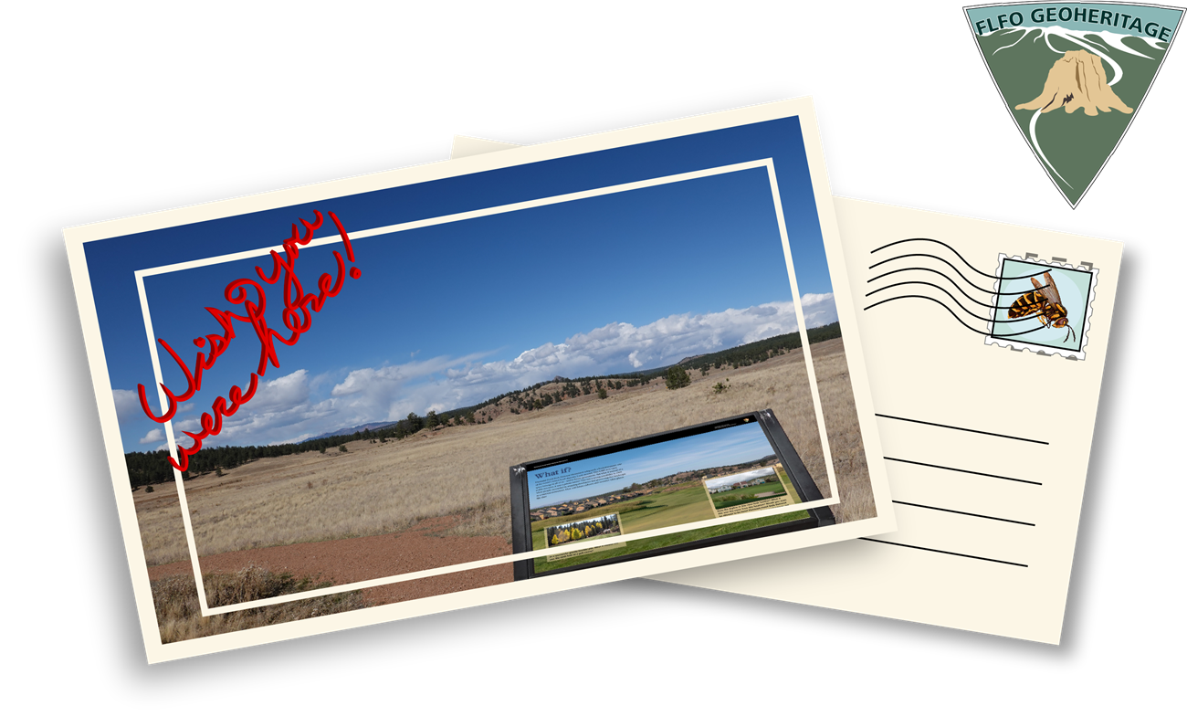 An illustration of a post card with a picture of a grassy valley with a mountain in the distance, in the lower right corner is a wayside panel in the upper left is the words "wish you were here" in red.