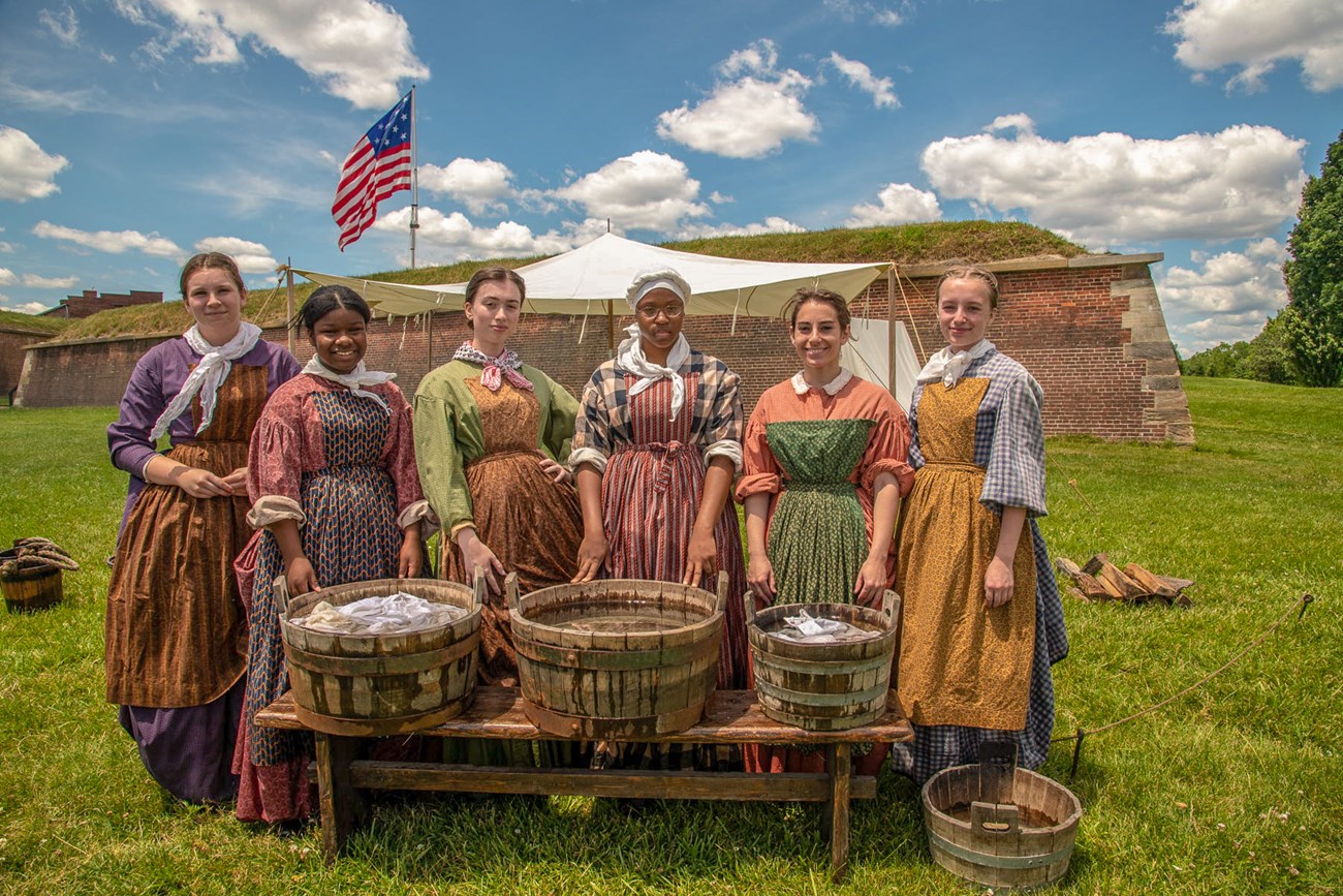 Women in War of 1812 dress representing laundresses