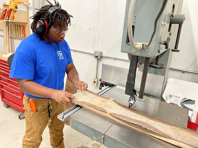 Intern working in woodshop
