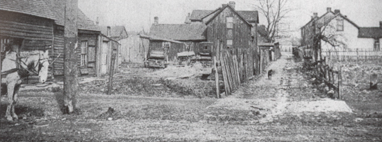 Black and white photo houses and Bakers Alley in Uniontown