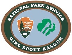 A patch with the National Park Service Arrowhead logo and the Girl Scout logo.
