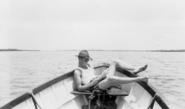 Young man in a boat