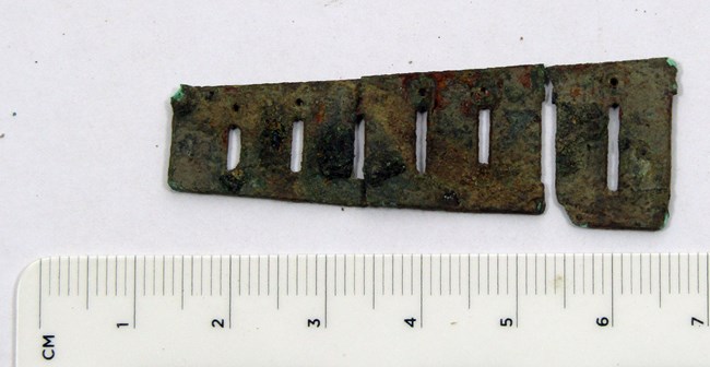 thin copper rectangle with rectangular holes