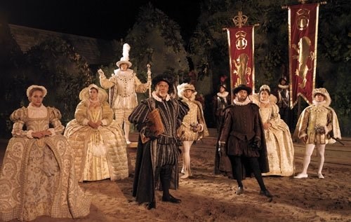 People dressed in formal Elizabethan clothes.