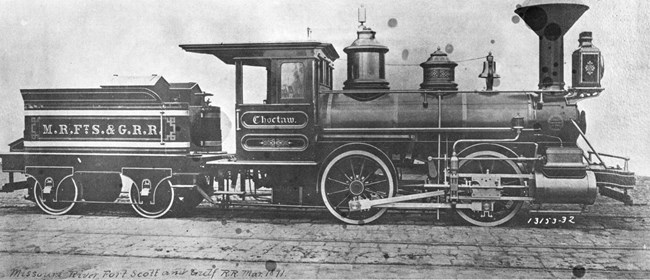 locomotive with tender (trailing railroad car)