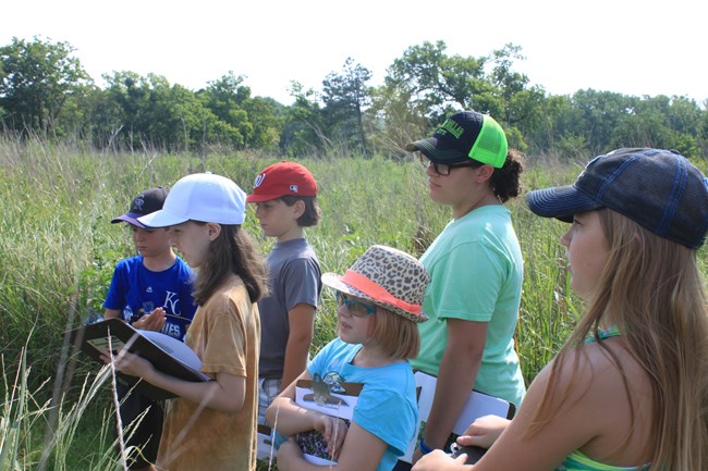 Youth exploring the prairie
