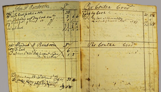 Ledger opened to two pages detailing transactions with John and Hendrick Roseboom.