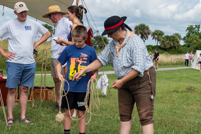 Living historians interact with visitors during Carolina Day events