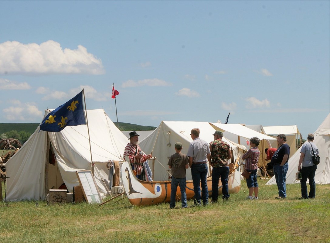 White tents with reencators