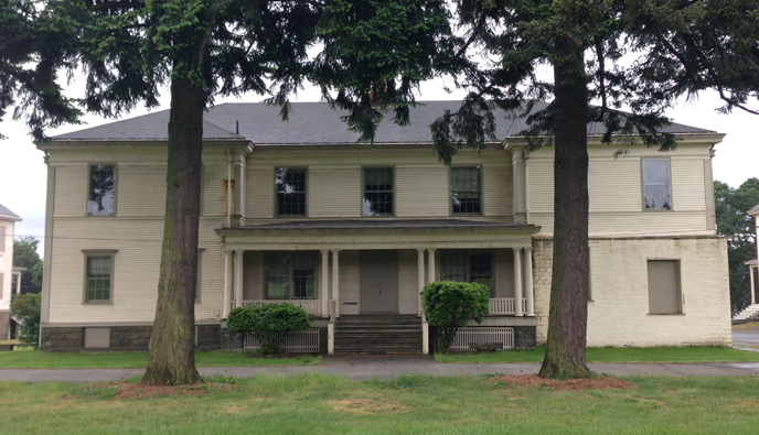 Present-day photo of the front of Building 991