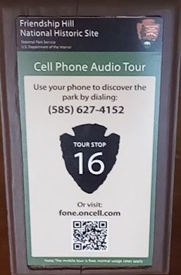 a marker telling you how to access the cell phone tour