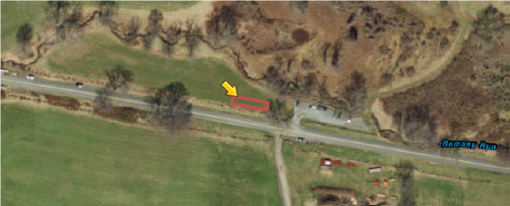 A map of the Ramsey parking lot showing the first amendment area outlined in red next to it along Ramsey Road.