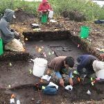 Archaeologists excavating at Matcharak Lake