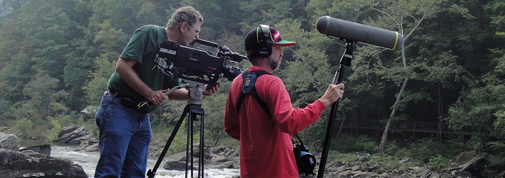 camera and sound men on riverside
