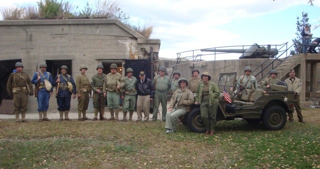 The Army Ground Forces Association poses at Battery John Gunnison. Who was John Gunnison? And why was his name removed from the battery (as seen in this photo)?