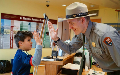Park ranger with new junior ranger