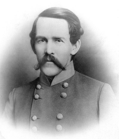 Man with a moustache in a gray military coat