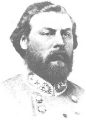 Photograph of a bearded man in a gray military coat
