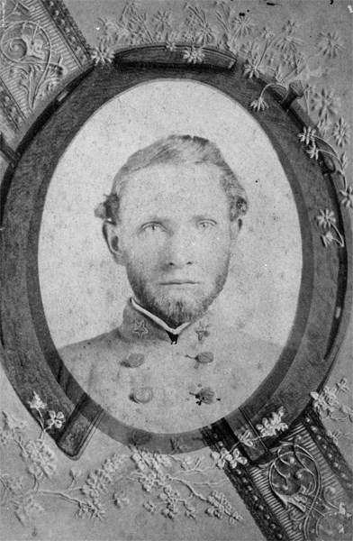 Black and white photograph of a bearded man