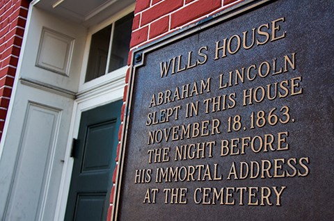 The sign at the front door of the David Wills house described how Abraham Lincoln stayed there on November 18, 1863.