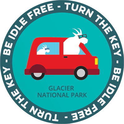 Two cartoon mountain goats riding in a car with slogan that reads, 'Turn the Key-Be Idle Free!'