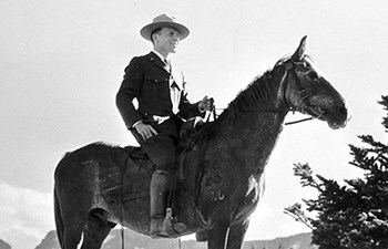 historic image of ranger astride horse