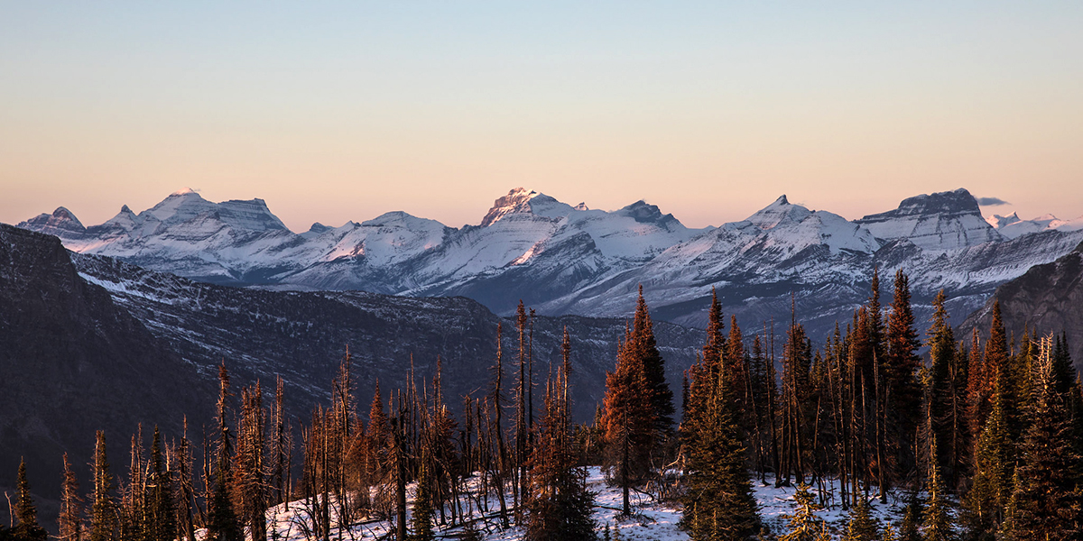 Evening light on mountains freshly dusted with new snow