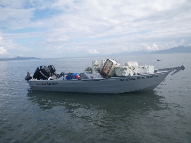 Skiff filled with beach trash