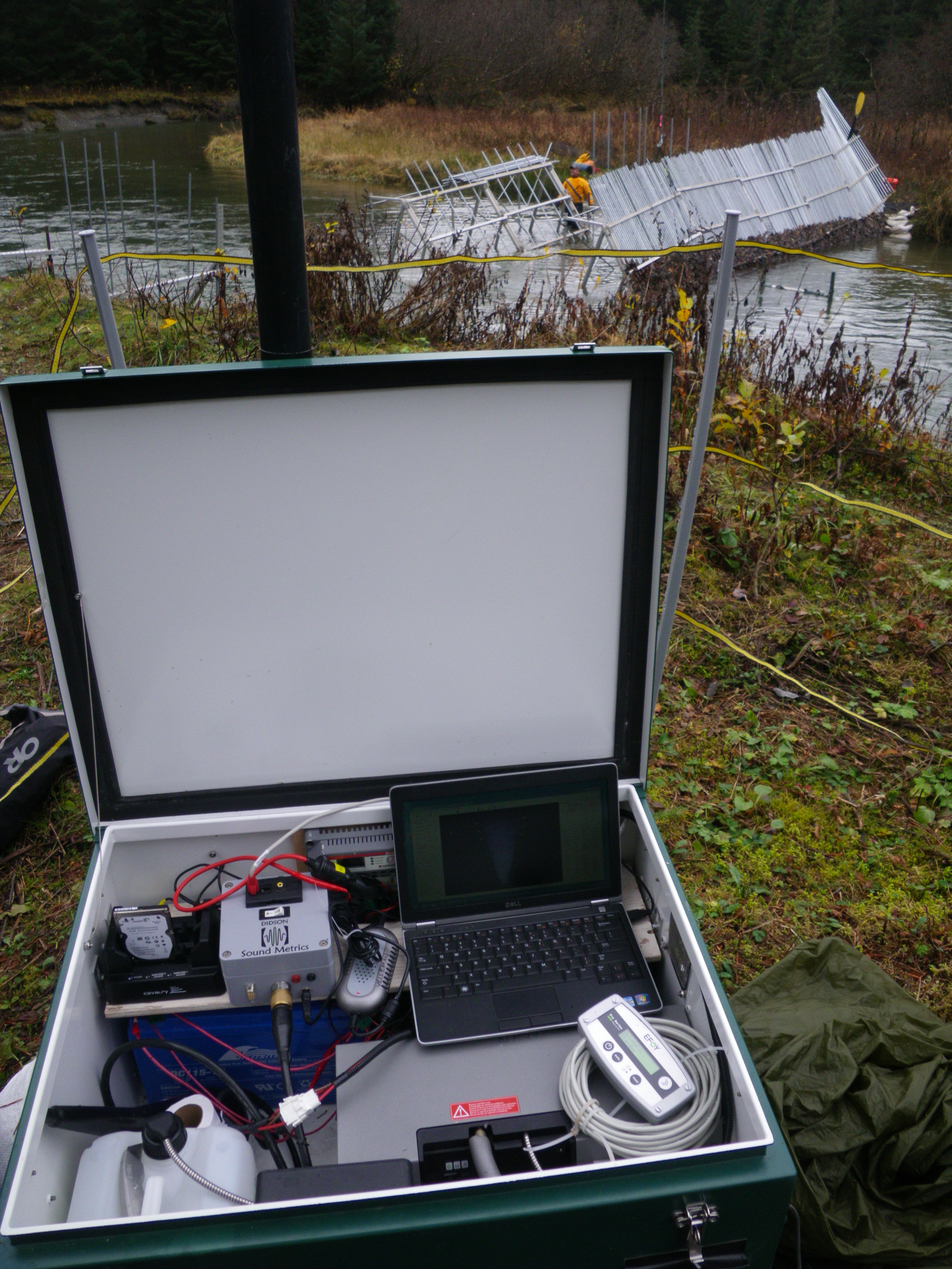 Sonar instrumentation with fish weir in the background