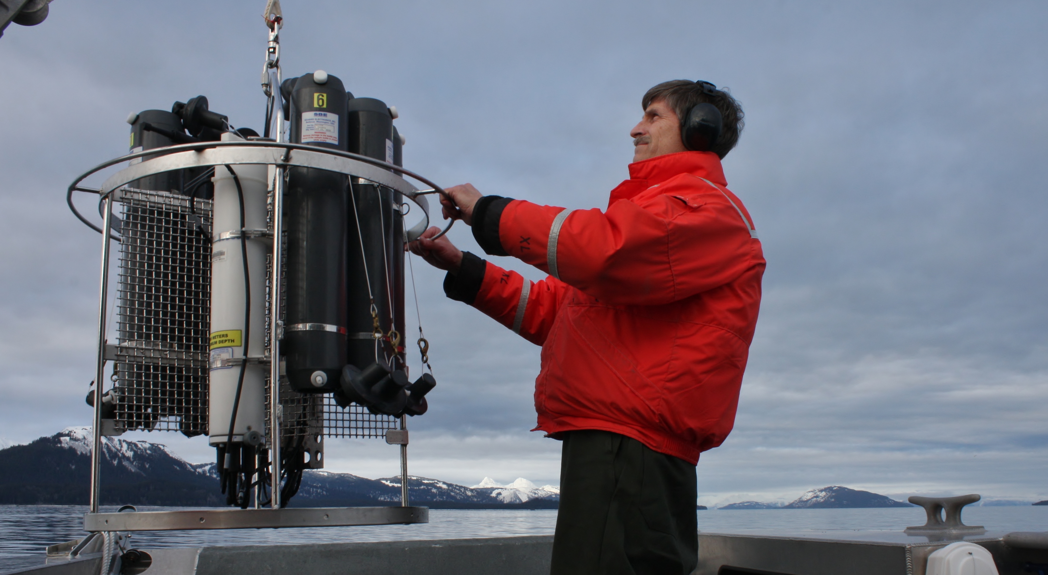 A researcher with ceanography survey equipment