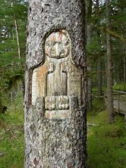 Eagle carving on spruce tree in Bartlett Cove.