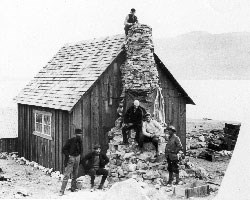 John Muir and geologists at his Glacier Bay cabin