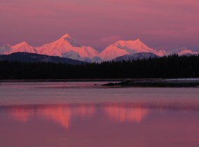 A pink sunset over the Fairweather Mountains.