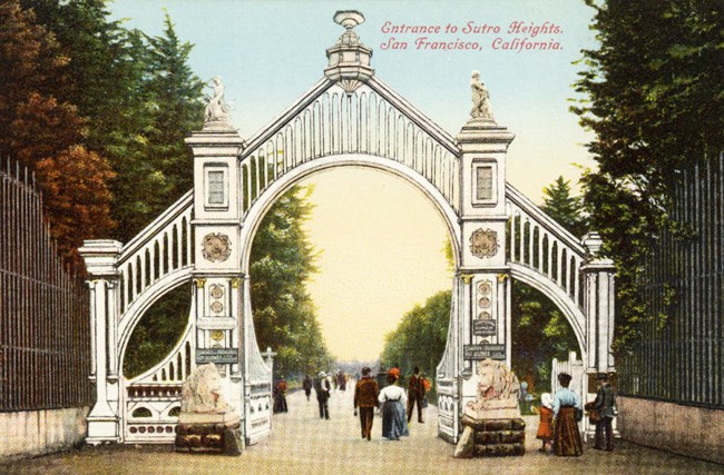 historic colored postcard of ornate garden gate with people entering