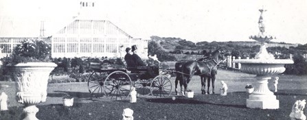 historic image of vistors in horse-drawn carriage at Sutro Height