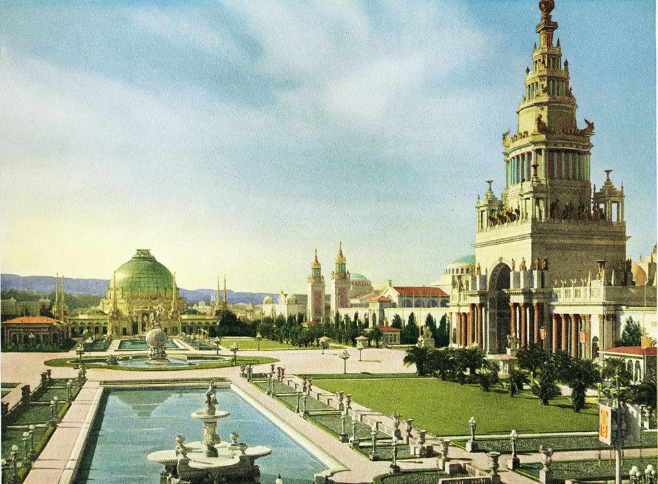 postcard image of tall ornate buildings near fountain