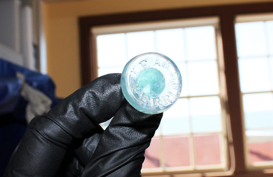 fragment of a historic blue glass bottle