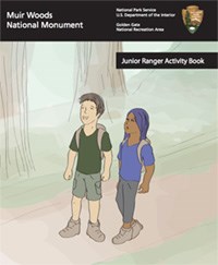 Cover of Jr. Ranger book with two young people on a trail in the redwods