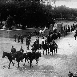 Historic image of troops at the Lombard Gate