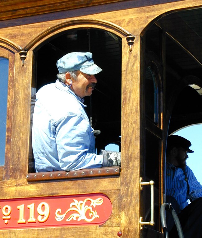 Hog Head Hat on Railroad worker