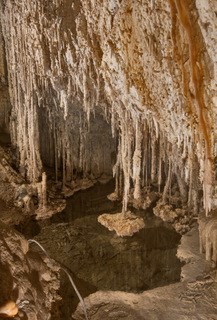 reflective pool with speleothems