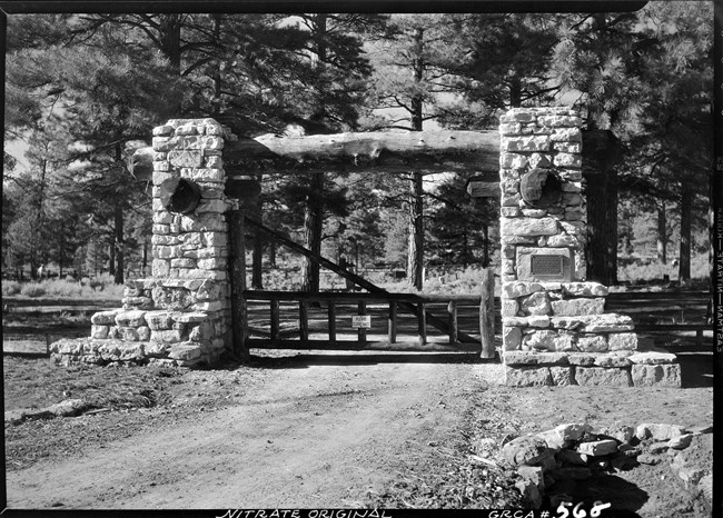 Black and white photo of the pioneer cemetery gate.