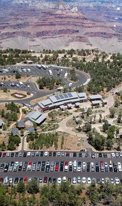 Aerial view of Grand Canyon Visitor Center looking north into the Grand Canyon.