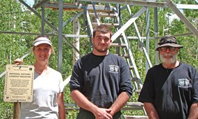 Amy Horn, Archeologist with fire management team members, Jared Fallon (middle) and Fred Adams (right)