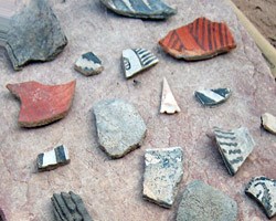 Many of the pottery sherds were decorated with black-on-white painted designs.