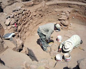 They were uncovering a kiva that had been completely buried by the sand dunes.