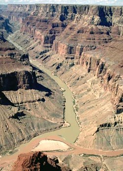 View from rim looking at confluence of Colorado and Little Colorado Rivers. NPS Photo by Tom Bean.